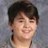 Christian smiling for school photo