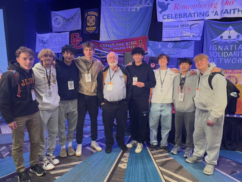 Students attending the IFTJ 2025 pictured with Fr. Greg Boyle, SJ,