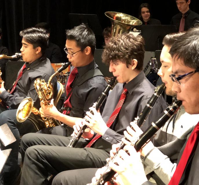 Woodwinds playing at graduation ceremony
