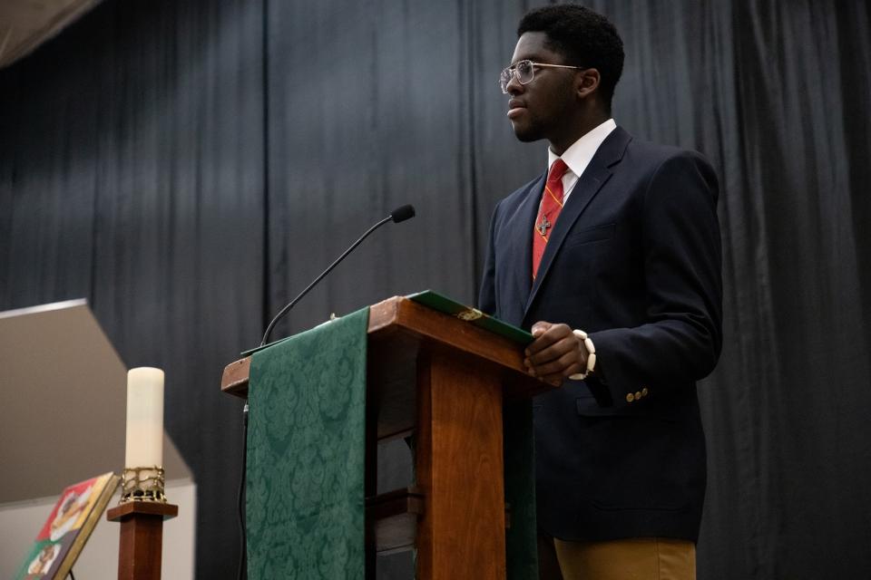 Student Obinna Okoye '19 speaks at last year's  Mass for Peace and Justice