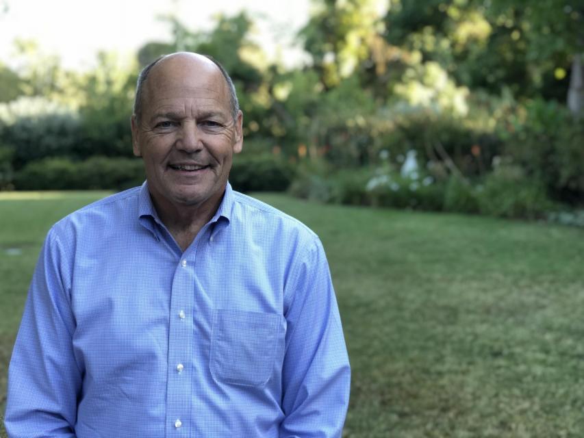 Image of Terry Street smiling in the garden