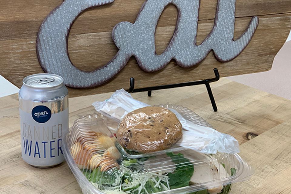 image of salad, cookie and water from cafe
