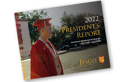 Image of front of 2022 issue with a graduate in robe standing in front of Memorial Auditorium