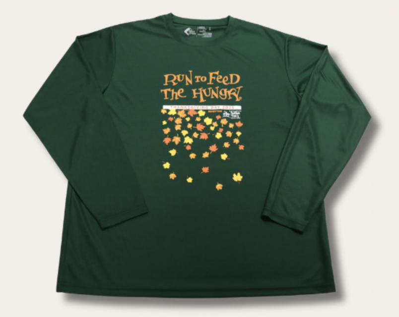 a green long sleeved tech shirt with leaf pattern and "Run to Feed the Hungry" logo